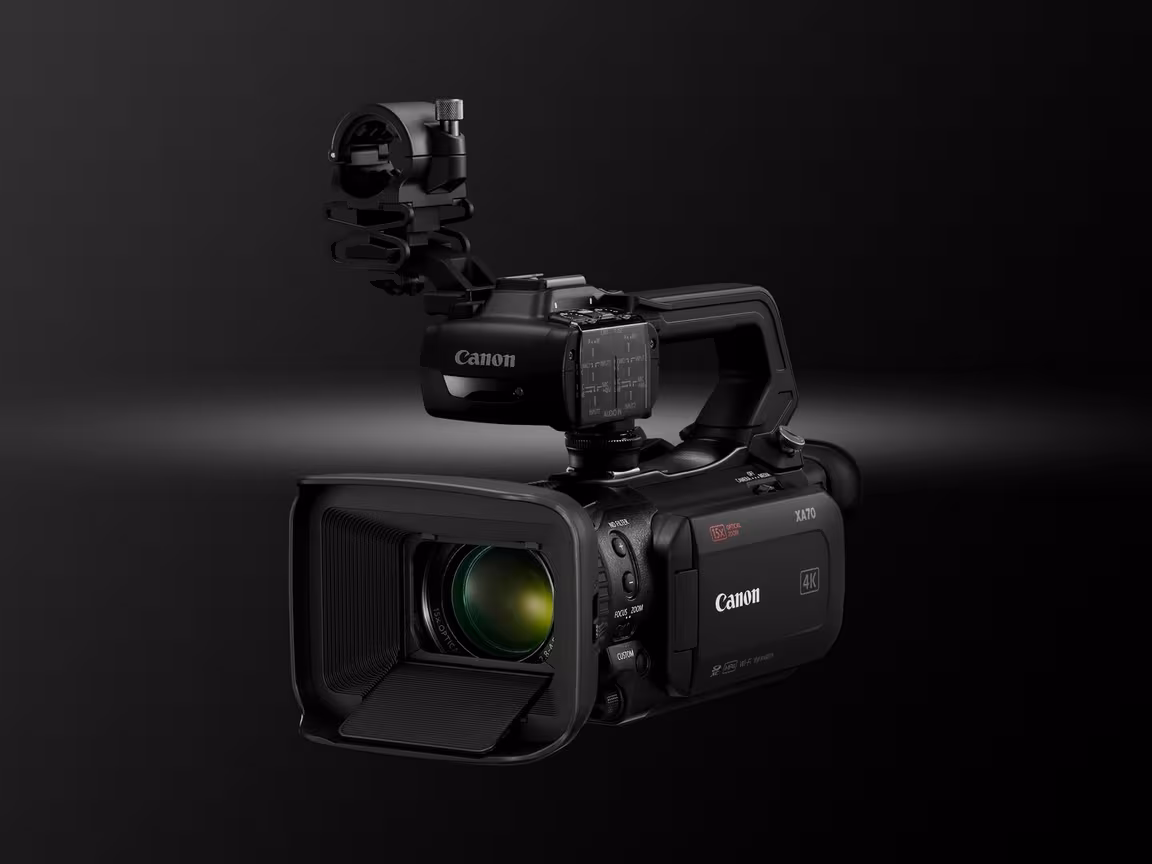 Canon XA70 camcorder on a tripod.